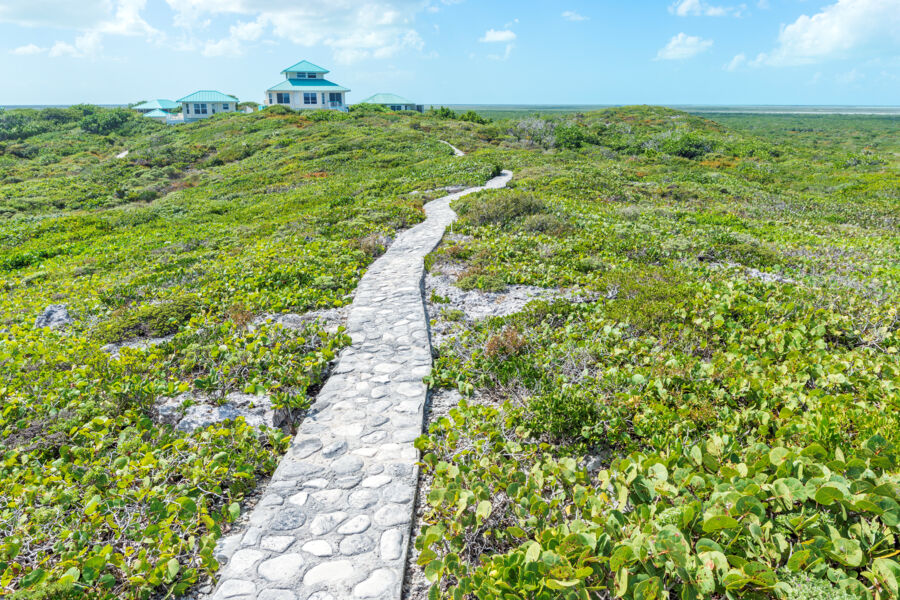 Foot path and vacation villa at Dragon Cay Resort