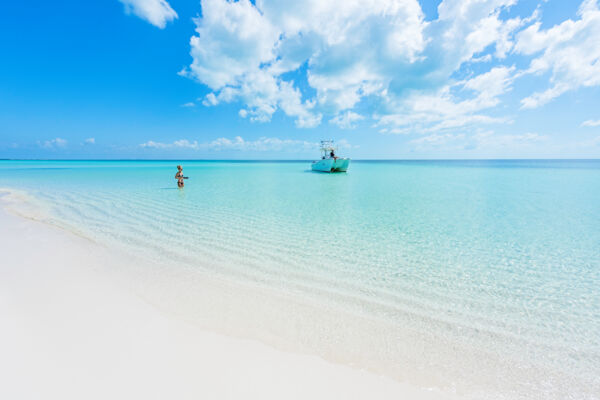 A boat near a beach on West Caicos