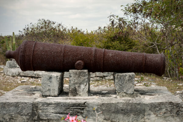 1700s cast iron cannon on a masonry plinth at Cheshire Hall Plantation