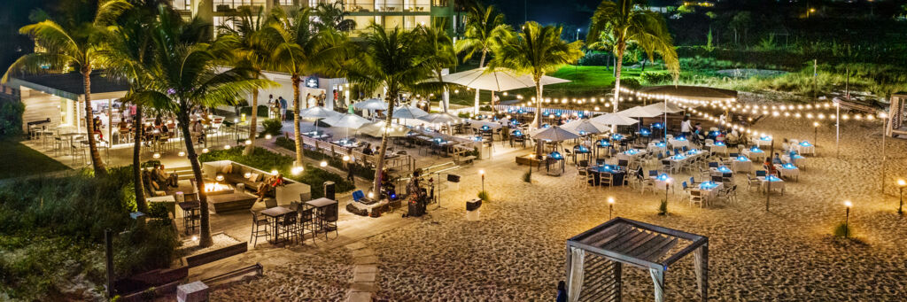 Aerial view of a beach BBQ and bonfire in Turks and Caicos.