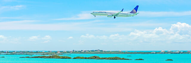 Airliner over the Chalk Sound National Park on Providenciales, Turks and Caicos