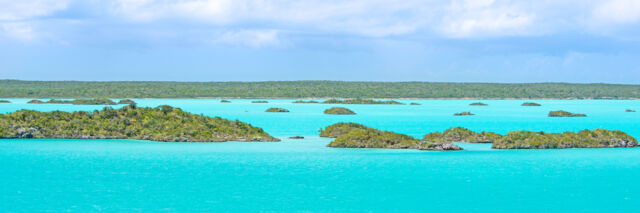 The turquoise water and small islands of Chalk Sound National Park