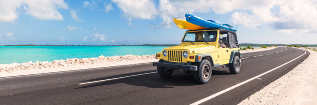 Jeep Wrangler with kayaks on the North Caicos and Middle Caicos Causeway