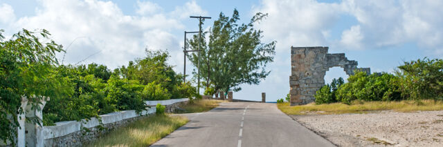 Road and ruins of old limestone salt warehouse on South Caicos