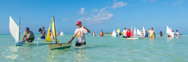 Model Caicos Sloop races at Bambarra Beach on Middle Caicos