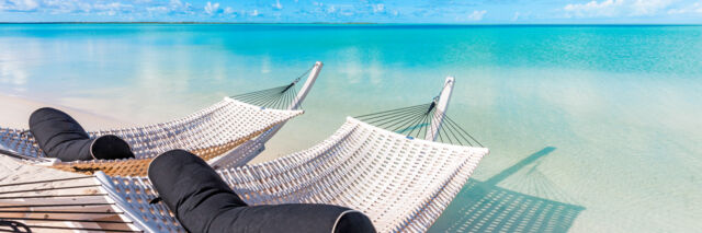 Hammocks at the tranquil lagoon beach at Sailrock 