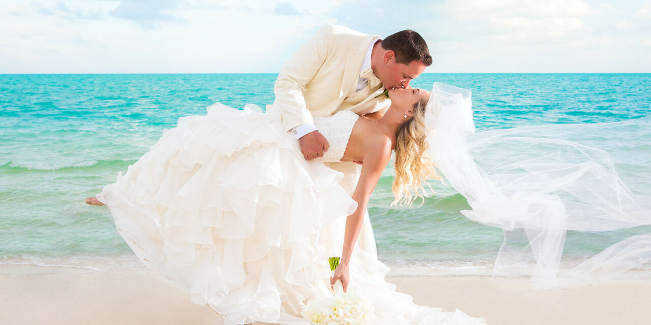 A wedding couple on Grace Bay Beach