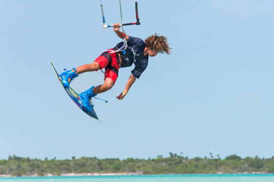 Youth kiteboarder at Half Moon Bay in the Turks and Caicos