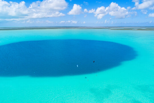 Aerial view of kiteboarders at the Middle Caicos Ocean Hole