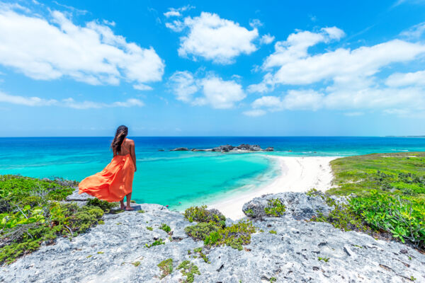 Person standing on the cliff above Mudjin Harbour in the Turks and Caicos