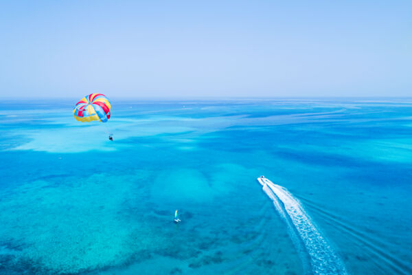 Parasail and sailboat in the Turks and Caicos