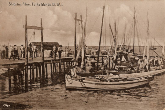 Vintage photo of the pier and lighter boats used to transport sisal