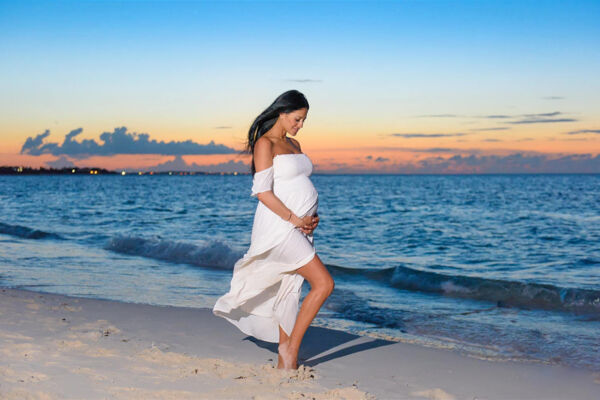 Sunset maternity photoshoot on Grace Bay Beach. 