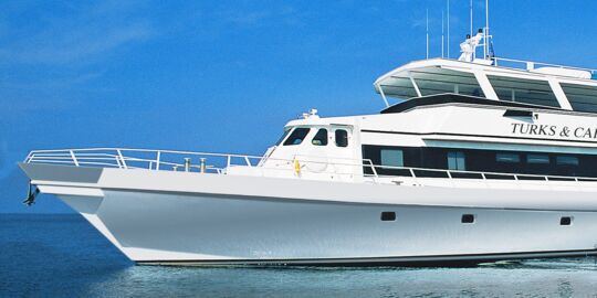 A large liveaboard yacht cruising in the Turks and Caicos Islands. 