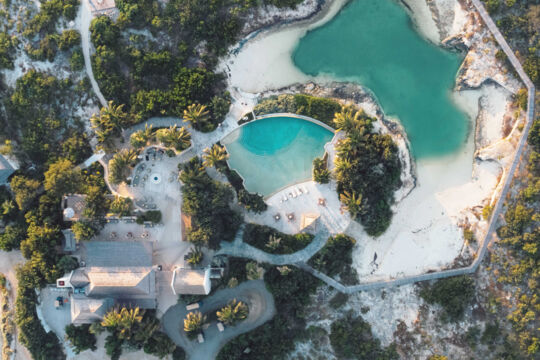 Main restaurant and spa building at Ambergris Cay Resort