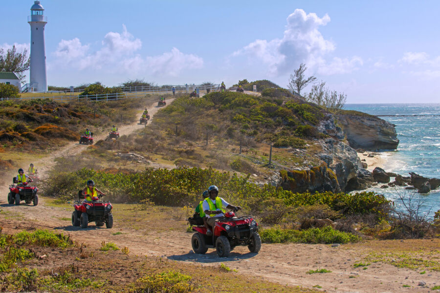 ATVs on the coastal path at the cliffs near the Grand Turk Lighthouse