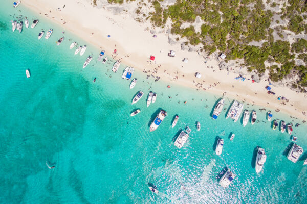 Boats anchored off Water Cay for the Caribbean House Evolution music festival.