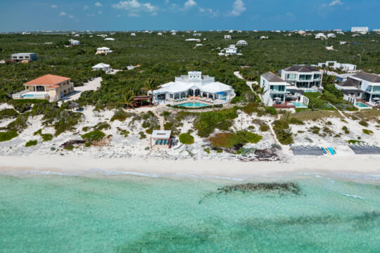 Aerial view of Conched Out Villa and Long Bay Beach