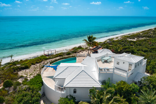 Aerial view of a villa on Long Bay Beach and the Caicos Banks