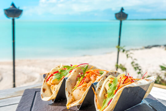 Plate of tacos at the beach