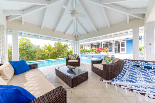 Pool cabana with loungers