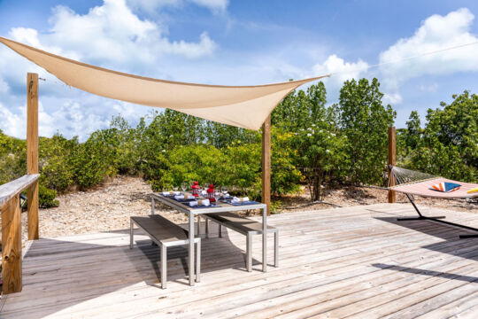 Deck with table and hammock