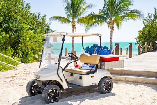 Golf cart at a beach.