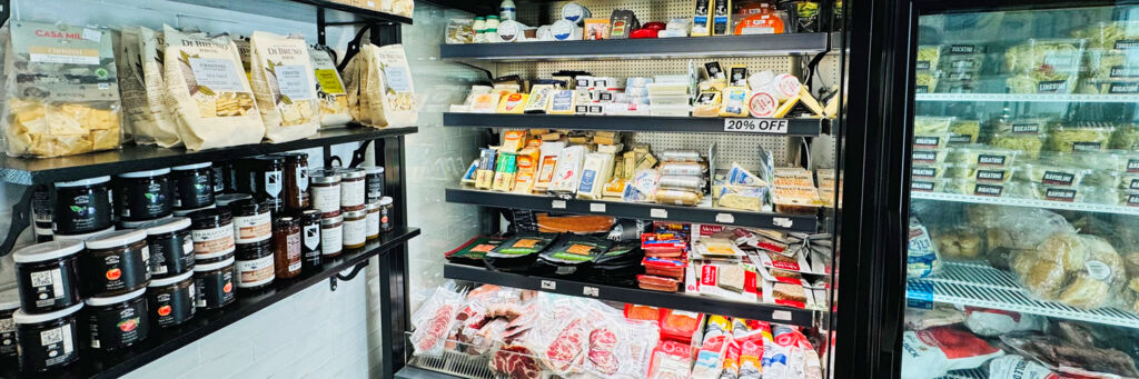 Artisanal cheese, jams, pastas, and preserves at a butcher shop in Providenciales. 