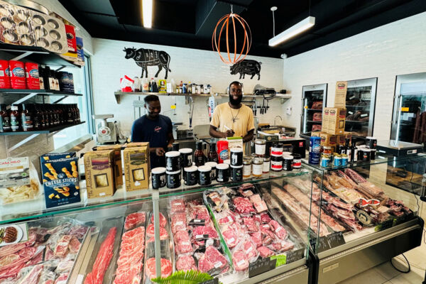 Butchers inside of a specialty butcher shop in Turks and Caicos.