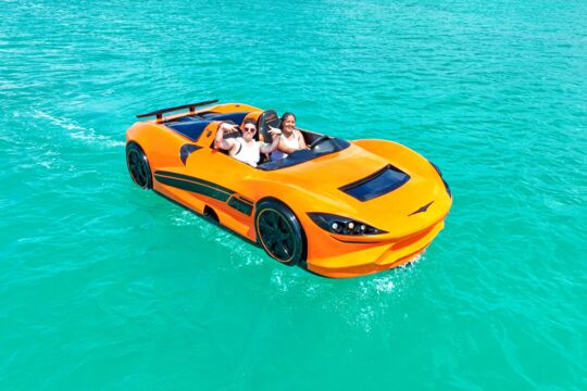 Couple riding in a jet car in Turks and Caicos.