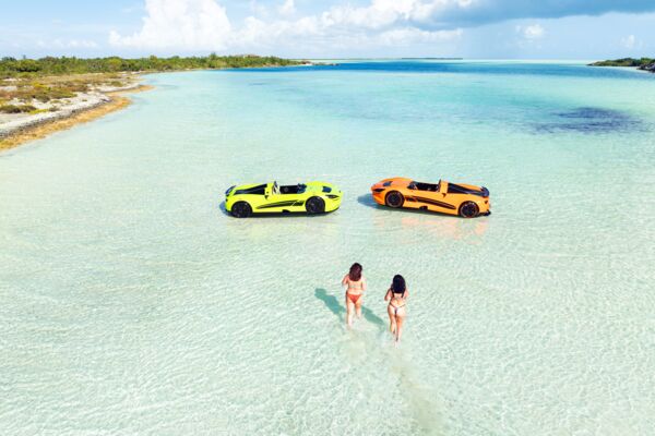 Drone photo of jet cars and tourists near Pine Cay and Water Cay.