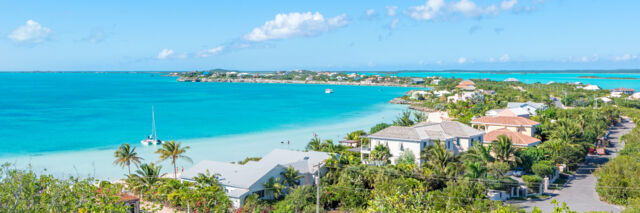 The view of Sapodilla Bay, Chalk Sound and luxury villas from Sapodilla Bay Hill