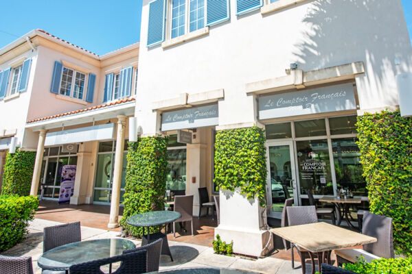 Exterior of a French deli in the Regent Village shopping plaza of Providenciales. 