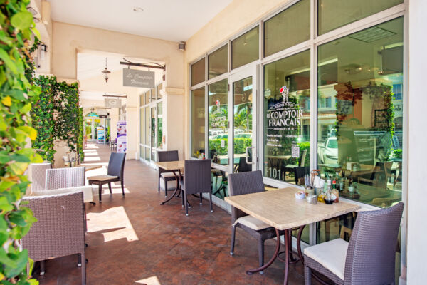 Outdoor seating at a French deli in Turks and Caicos. 