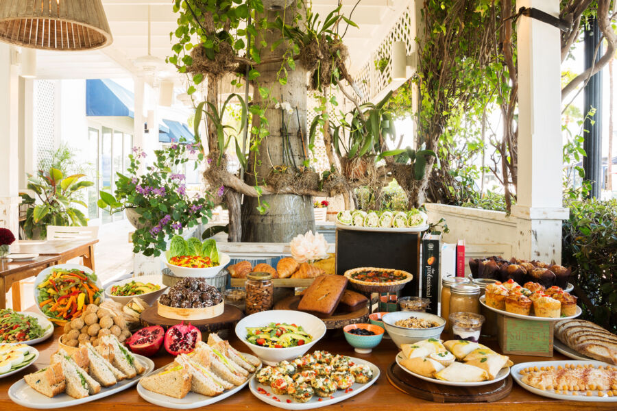 Plates on a table at exterior seating area at Lemon 2 Go in Grace Bay.