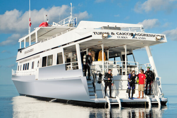 Divers preparing for a dive on a liveaboard in Turks and Caicos.