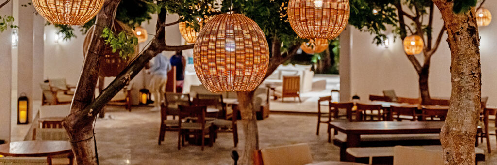 Rattan lamps hanging in a fine dining restaurant in Providenciales, Turks and Caicos. 