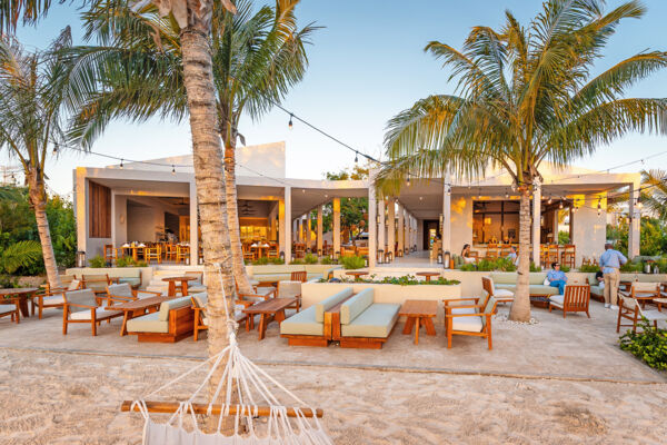 Golden hour at a waterfront fine dining restaurant on Providenciales, Turks and Caicos.