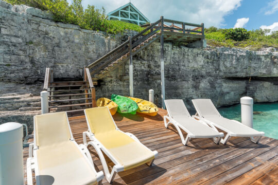 Sun loungers on a dock