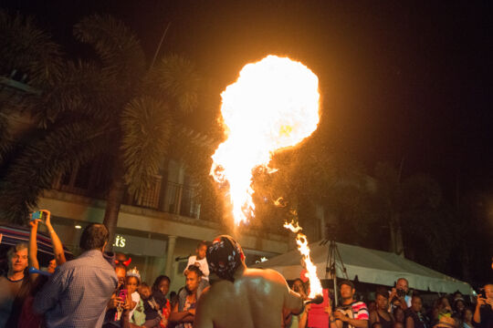 Man breathing fire at a street festival in Turks and Caicos. 