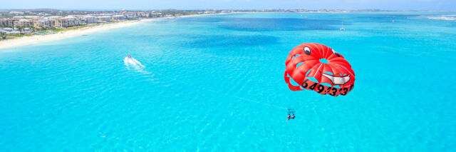 Parasailing off Grace Bay Beach at Providenciales