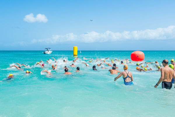 Swimmers compete in an open water swim competition off Grace Bay Beach. 