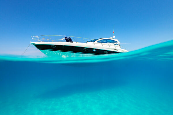 Yacht floating in clear water
