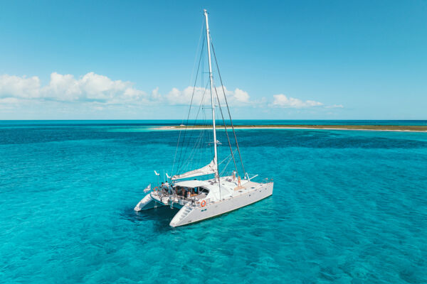 Luxury catamaran sailing the turquoise waters of the Turks and Caicos.