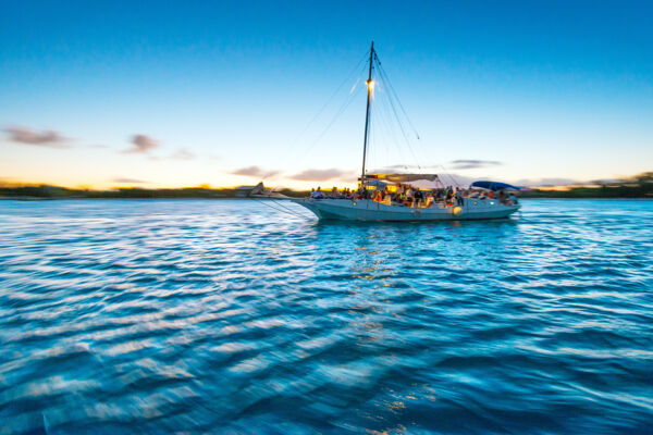 Sailboat at dusk in Leeward Channel off Providenciales.