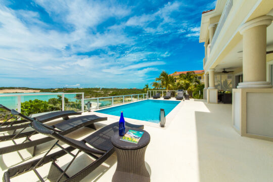 Pool and loungers at Sunset Close