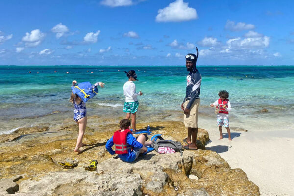 Snorkelers on the coast at Smith's Reef