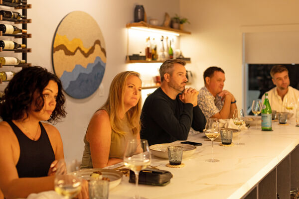 Diners at a chef's table restaurant in Grace Bay, Turks and Caicos.