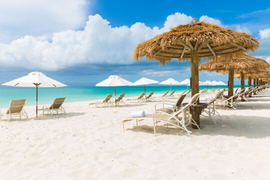 Beach loungers and umbrellas at The Sands