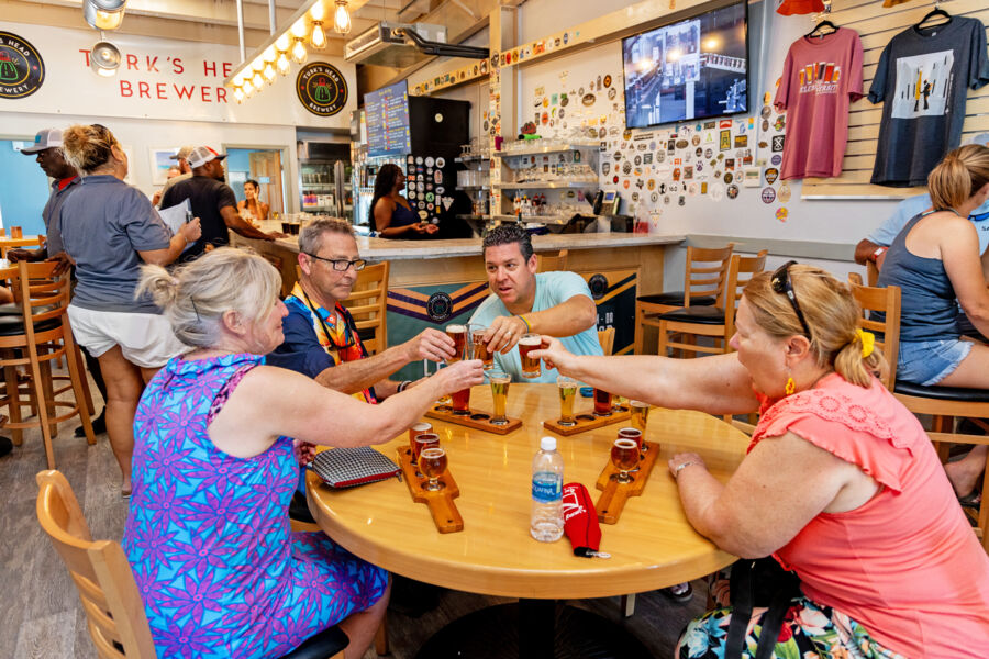 People trying a flight of beer at the Turk's Head Brewery.